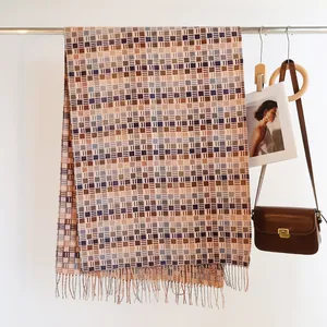 Winter plaid tassel scarf with warm geometric pattern in neutral earth tones
