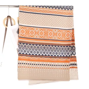 Ethnic Mayan style double-sided cashmere shawl with orange and navy geometric patterns