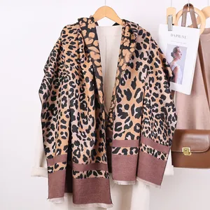 Fashionable leopard print cashmere-like scarf with fringe and classic camel color tone