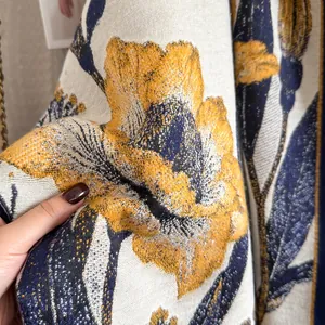 Close-up of premium thick cashmere shawl with vintage floral jacquard pattern detail