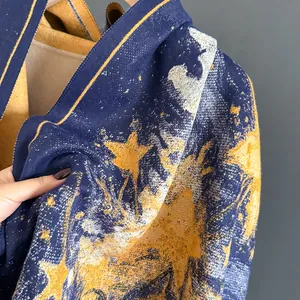 Star pattern knit scarf with warm beige fleece lining and zipper closure detail