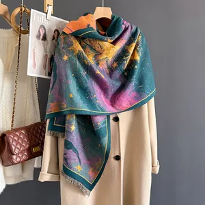 Detailed view of women's thick artistic print scarf with fringe and soft cashmere texture