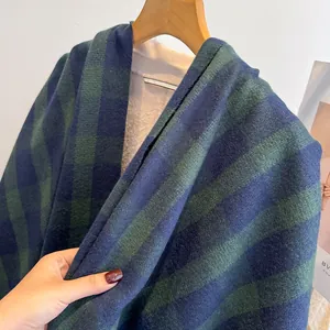 Thick checkered scarf for women with warm fleece lining and elegant dark plaid pattern