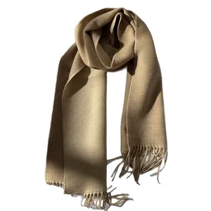 Classic camel wool scarf with elegant tassel ends for autumn and winter warmth