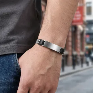 Men's mechanical stainless steel bracelet with black textured strap and brushed metal plate