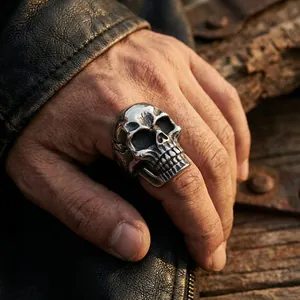 Detail of vintage skull ring featuring distressed finish and intricate bone textures