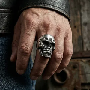 Detailed view of skull ring on model with vintage industrial style background