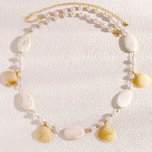Boho Perlen-Taillenkette mit Marmorsteinen und Muschelanhängern für den Strandurlaub