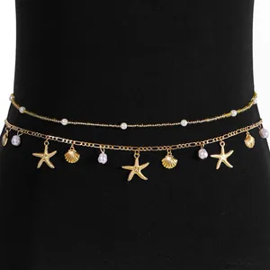 Goldene Bauchkette im Boho-Stil mit Seestern- und Muschelanhängern und Perlen