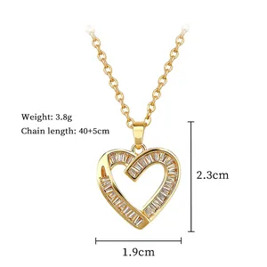 Detail view of gold heart necklace with dimensions 2.3x1.9cm and 40+5cm chain length