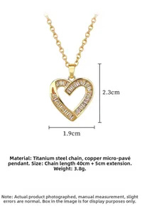 Detail of gold heart pendant with titanium steel chain, showing 2.3cm height dimension