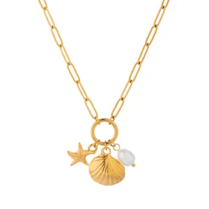 Elegant 18K gold starfish shell and pearl pendant necklace on a paperclip chain link