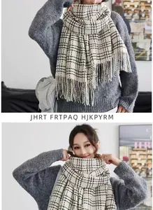 Detail of classic black and white plaid scarf featuring soft cashmere texture and tassels