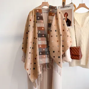 Soft reversible cashmere-like scarf with colorful polka dots and fringe details