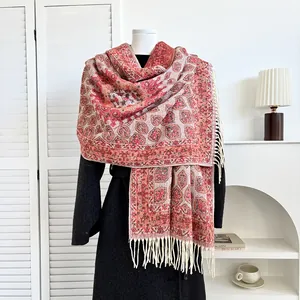 Close-up of ethnic style cashmere-feel shawl with intricate patterns and fringe tassels