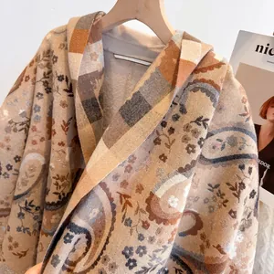 Detailed view of the thick paisley pattern cashmere-like pashmina shawl texture