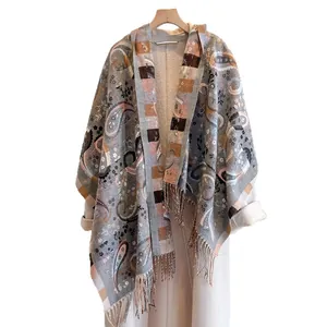 Ethnic paisley cashmere-like scarf with colorful geometric patterns and fringe