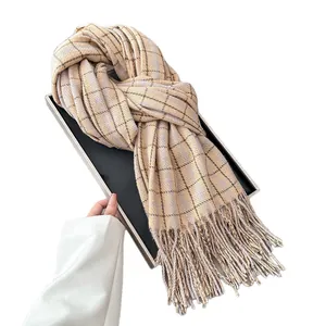 Plaid cashmere-feel scarf in khaki and purple with tassels, shown in a gift box