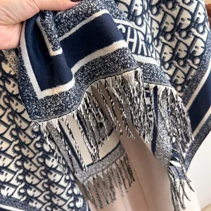 Navy blue and beige jacquard scarf with letter pattern and fringe trim finish