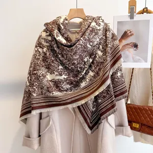 Detail of pashmina shawl with oil painting landscape pattern and soft tassels