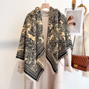 Luxurious double-sided floral cashmere scarf in black and beige with fringe trim