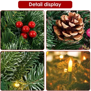Close-up of frosted Christmas garland with warm LED lights, pine cones and red berries