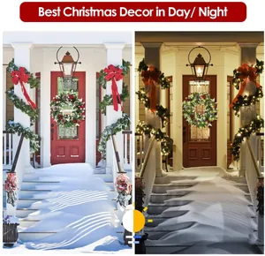 Detail of pre-lit Christmas garland and wreath set with red berries and warm LED lights