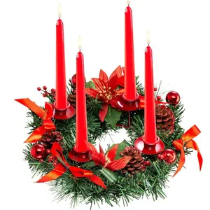 Classic Christmas advent wreath with four red candles, pine needles and silk ribbons