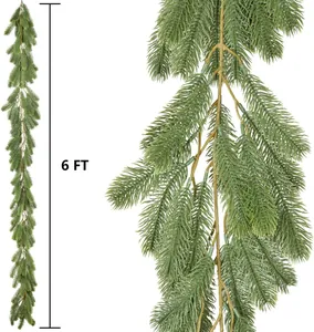 Detail of 6ft artificial PE pine garland showing realistic green needles and brown stems