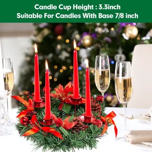 Christmas advent wreath with red poinsettias, pine cones and 4 metal candle holders