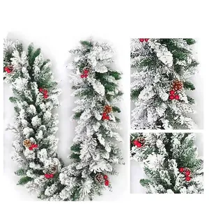 2.7m flocked Christmas garland with artificial snow, pine cones and red berries for decor