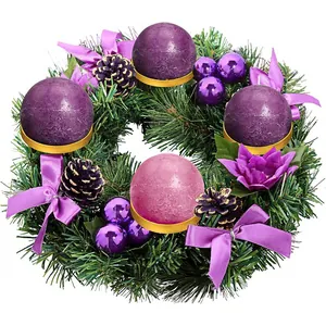 Elegant purple Advent wreath with four candles, pine needles, and golden ornaments