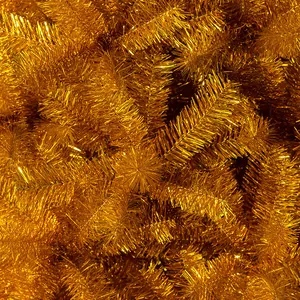 Lush golden artificial Christmas tree branch made of shiny dense PET material