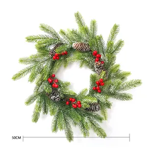 Detailed 50cm Christmas wreath with pine needles, cones and red berries on white background