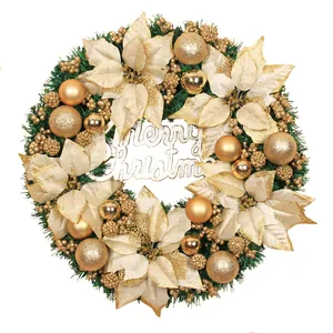Goldener Weihnachtskranz mit Tannennadeln, Weihnachtsstern und Weihnachtsschild