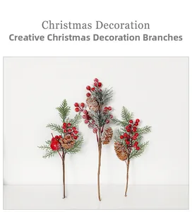 Close-up of frosted Christmas picks with red berries, pine needles and cones
