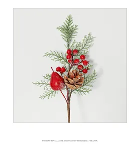 Detailed close-up of festive red berries, pine needles, and pinecone with artificial snow