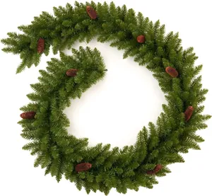 Close-up of flexible 270cm PVC Christmas garland featuring natural pine cones and dense needles