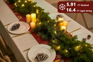 Close-up of 5.91ft PE pine garland with 16.4ft warm LED lights on a festive table