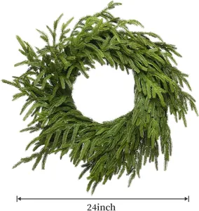 Close-up of a 24-inch green artificial forest Christmas wreath with dense pine needle texture