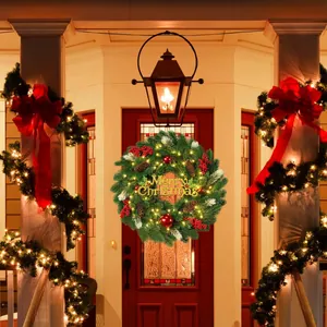 Lighted Christmas wreath with pine cones and red berries on a front door background
