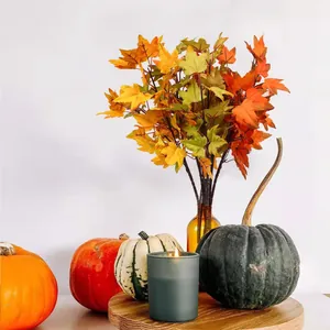 Vibrant artificial maple leaf branches with pumpkins on wood base for fall home decor
