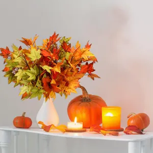 Artificial maple leaf branches in white vase for autumn farmhouse table centerpiece