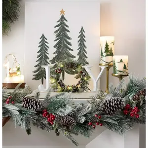 Christmas JOY sign with LED evergreen wreath, flocked pine needles, and pine cones