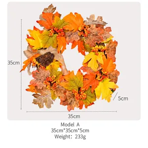 Detail view of autumn wreath showing size dimensions, maple leaves and berries