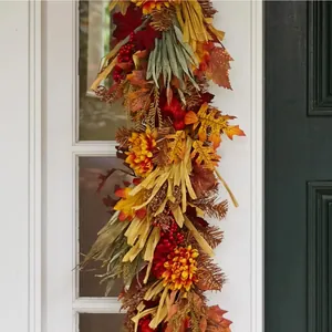 Autumn wreath with maple leaves and berries for front door home wall decor