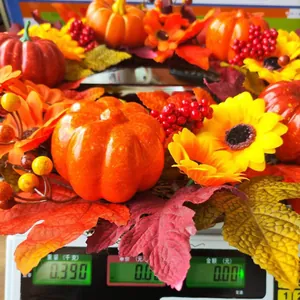 Detail shot of the autumn wreath on a scale weighing 0.390kg for shipment measurement