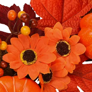 Autumn rattan wreath with sunflowers maple leaves and pumpkins for festive door decoration