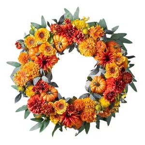 Fall autumn wreath for front door with yellow sunflowers pumpkins and eucalyptus leaves
