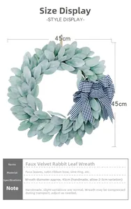Detail showing 45cm artificial flocked eucalyptus wreath with blue plaid ribbon bow